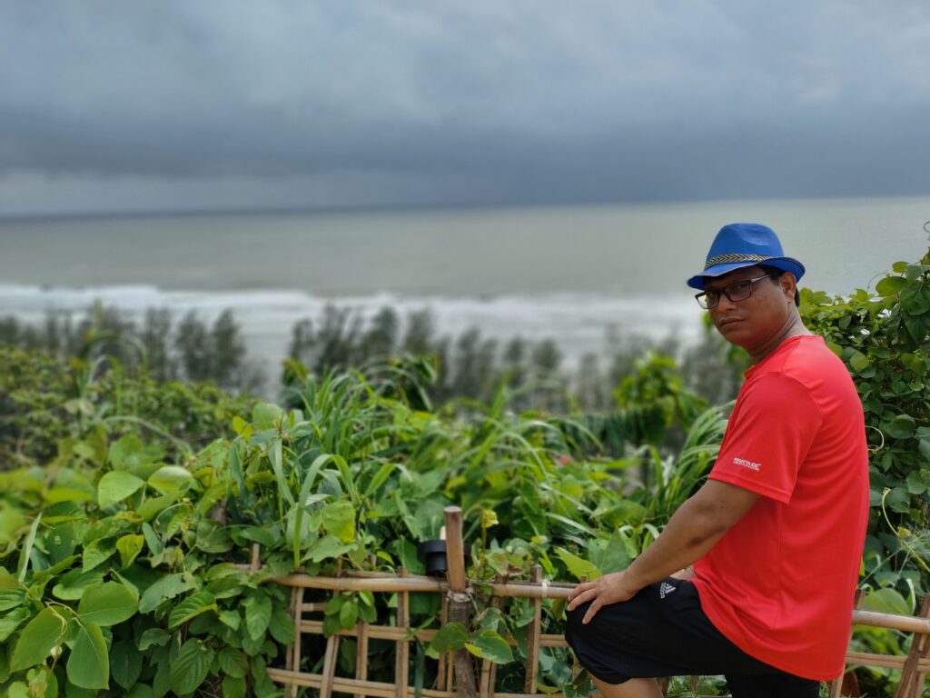 ceo of wellness a living stand up a hill infront of sea